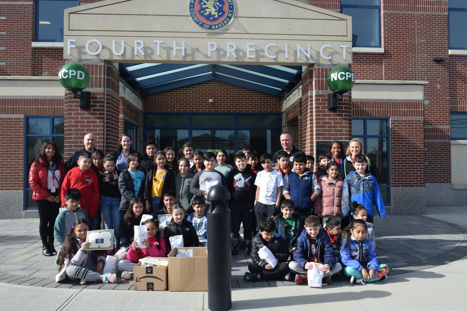 Lawrence Elementary School students visit the 4th Precinct in Hewlett